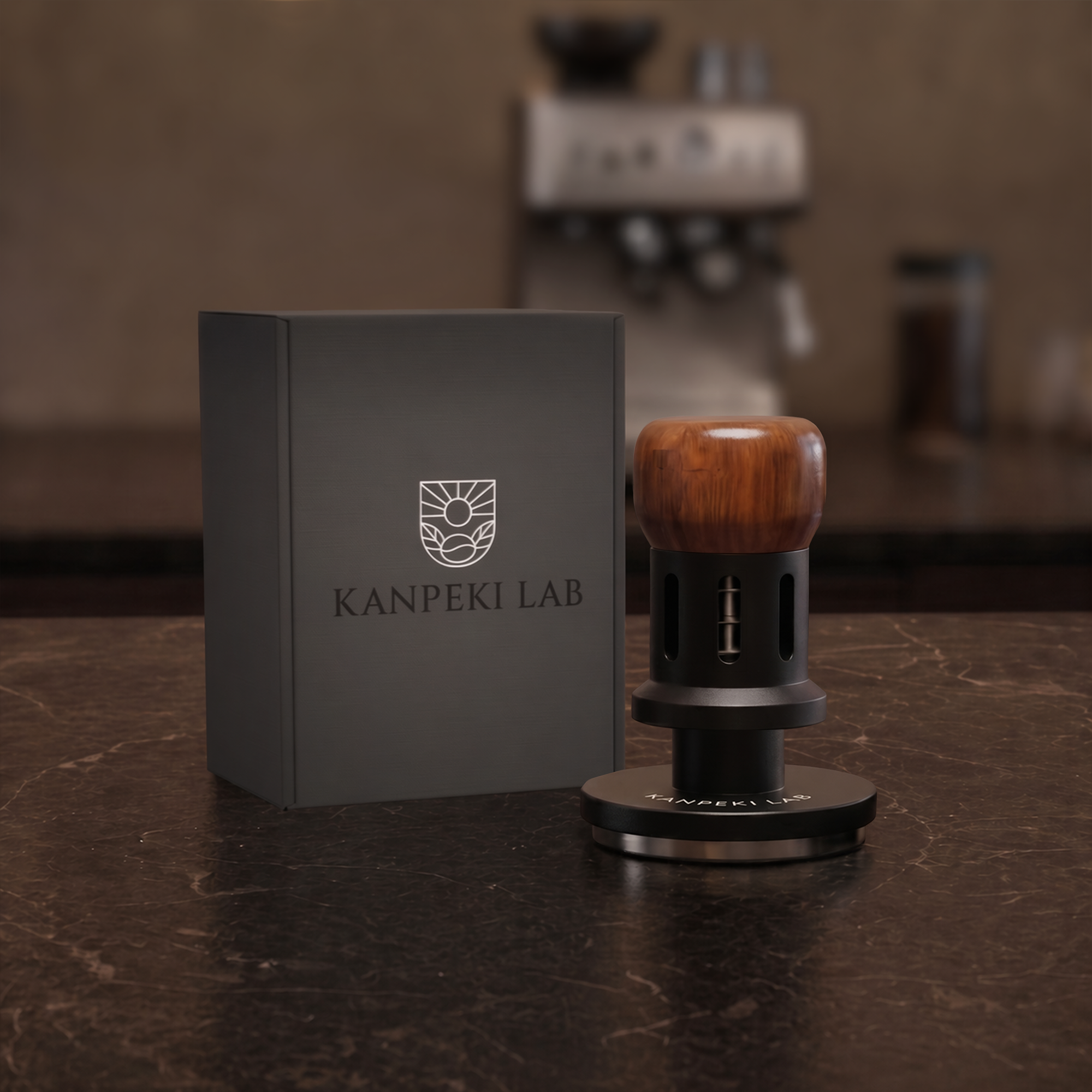 Kanpeki Lab V1 Calibrated Tamper with branded packaging on a dark marble counter